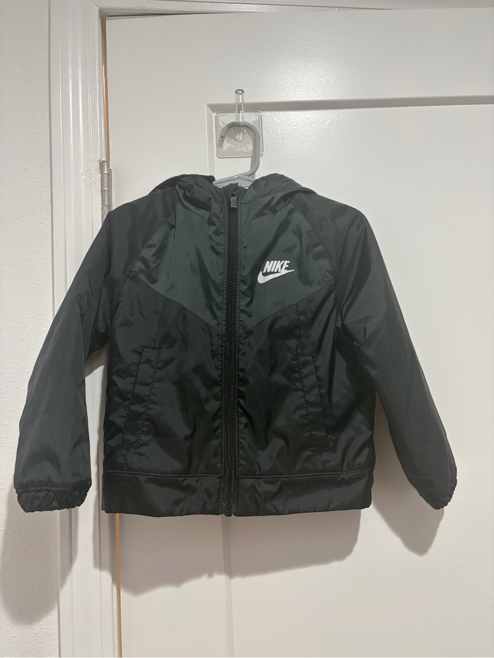 Nike Kids Black Hooded Rain Jacket with White Logo